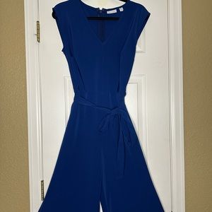 NEW YORK & COMPANY: BELTED NAVY BLUE ROMPER.